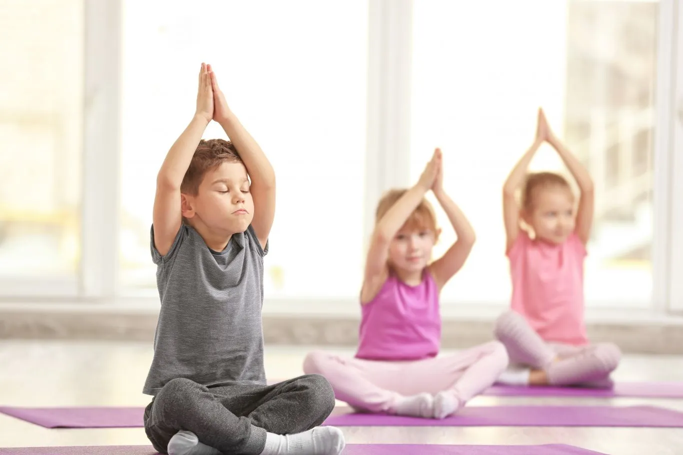 How can yoga contribute to the healthy development of your kid?